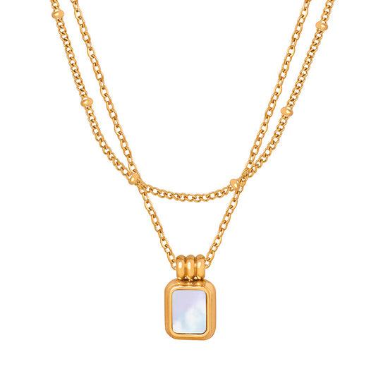 Halskette mit Anhänger aus 18K Gold und weißer Perlmuttmuschel